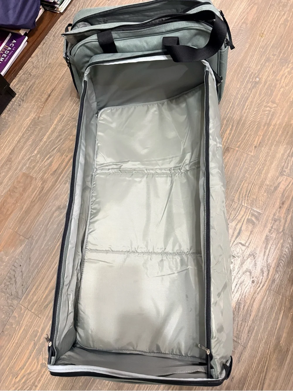 Diaper duffel bag with sleeping section for baby